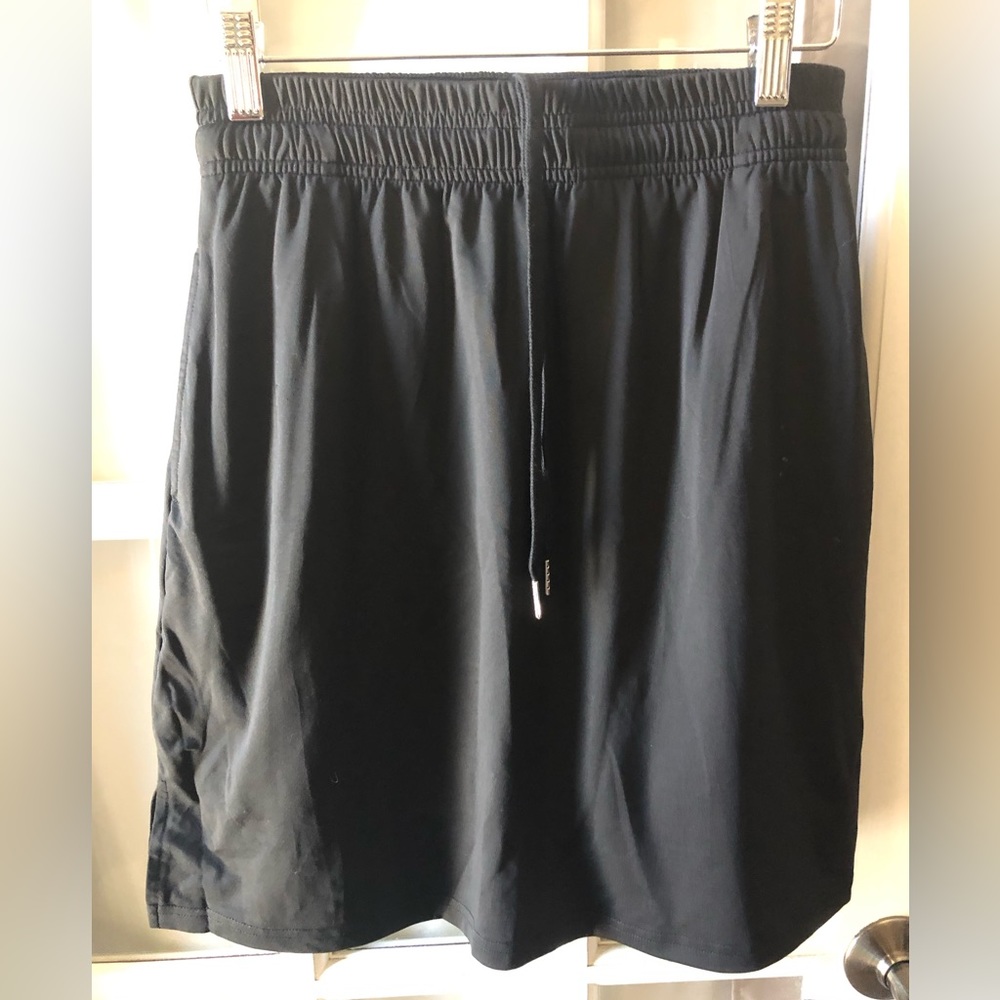 Women’s black tennis skort in size small with pockets